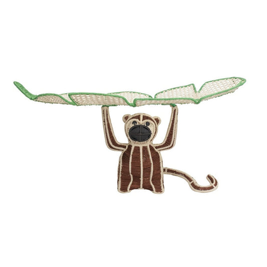 Embroidered patch of a monkey holding a leaf on a white background