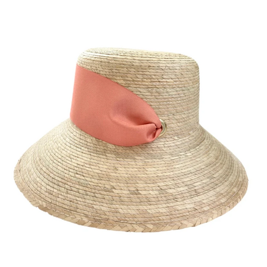 Beige straw hat with a pink band on a white background